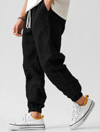 Jonas | Herren Jogger-Hose mit Tunnelzug, Tapered-Fit Sommerhose | Nomad NTS | Schwarz