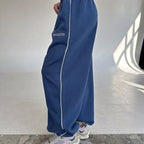 Maelle | Damen Baggy-Fit Jogginghose mit Seitenstreifen, weit geschnittene Lounge-Hose | Nomadnts | Pink