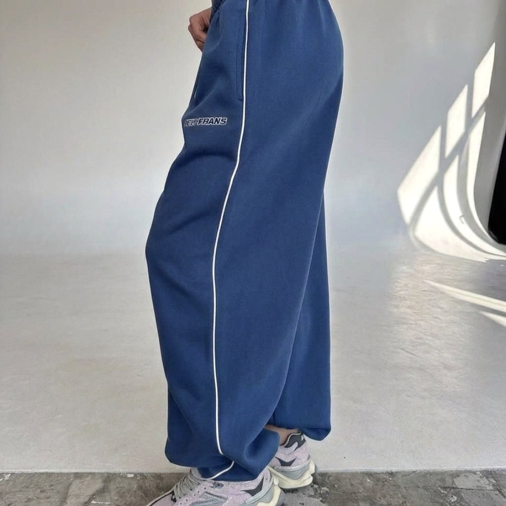 Maelle | Damen Baggy-Fit Jogginghose mit Seitenstreifen, weit geschnittene Lounge-Hose | Nomadnts | Pink