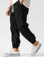 Owen | Herren locker geschnittene Leinen-Jogginghose, Hose mit schmal zulaufendem Knöchel | Nomadnts | Black